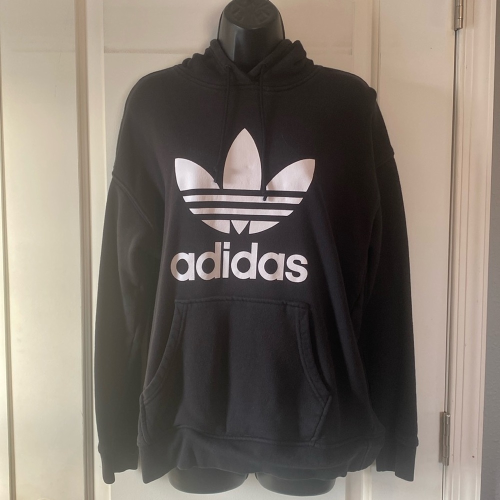 Size medium Adidas unisex sweatshirt with hood.